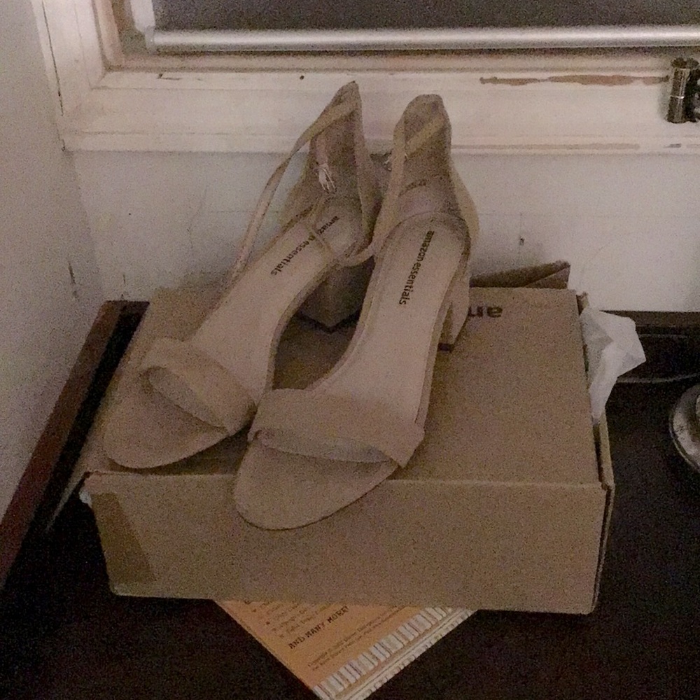 Cream heels in the size 9.5
